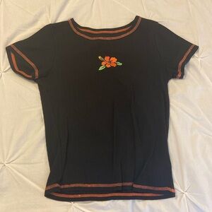 black shirt with hawaiian flower